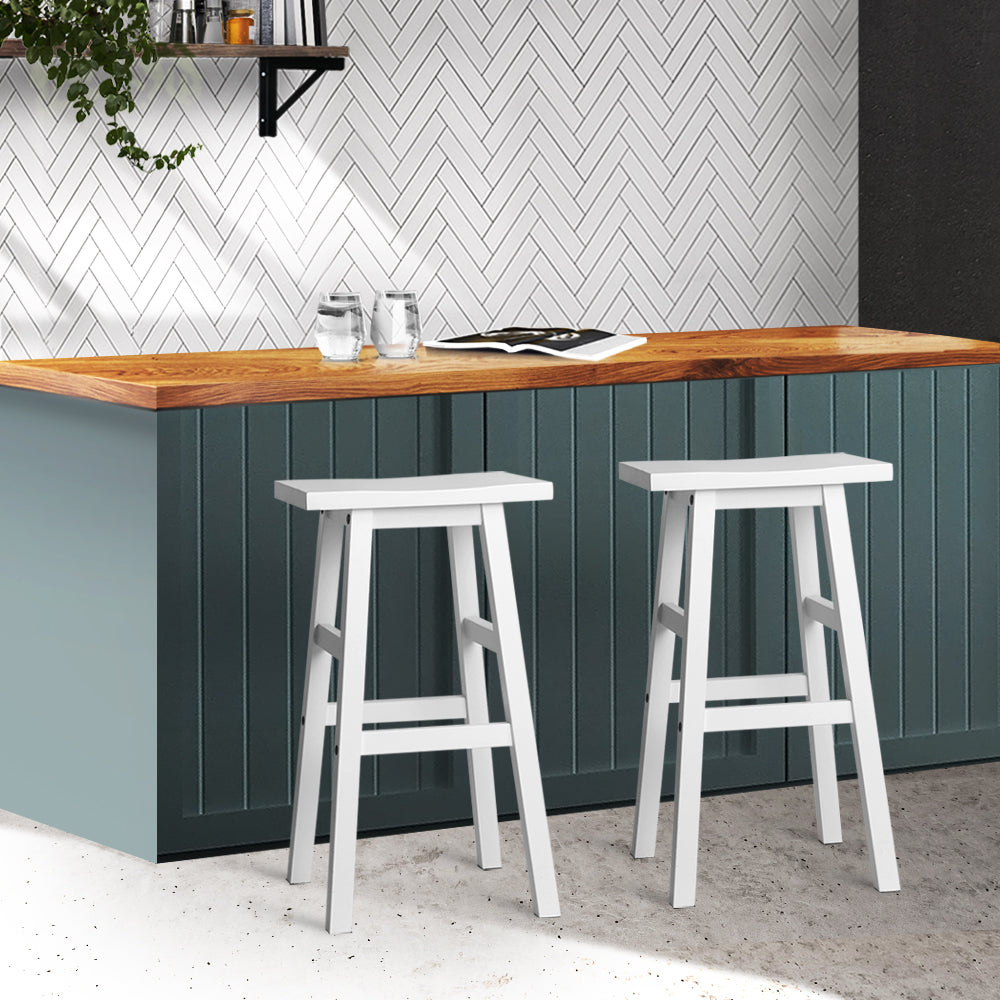 Artiss Set of 2 Beech Wood Bar Stools in White, featuring a contoured saddle seat and sturdy construction.