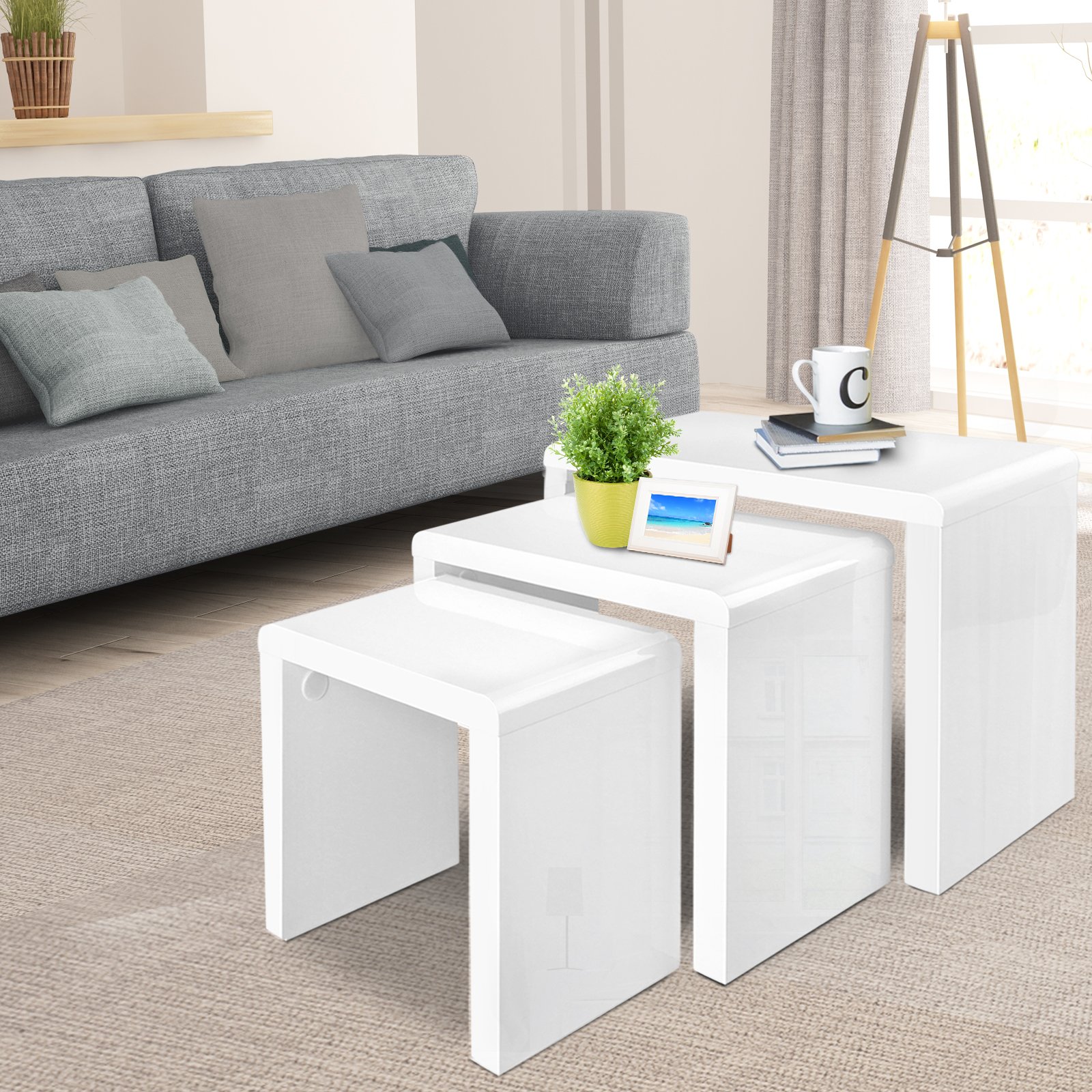 Artiss Set of 3 Nesting Tables in glossy white finish, showcasing three different sizes for versatile use in modern interiors.