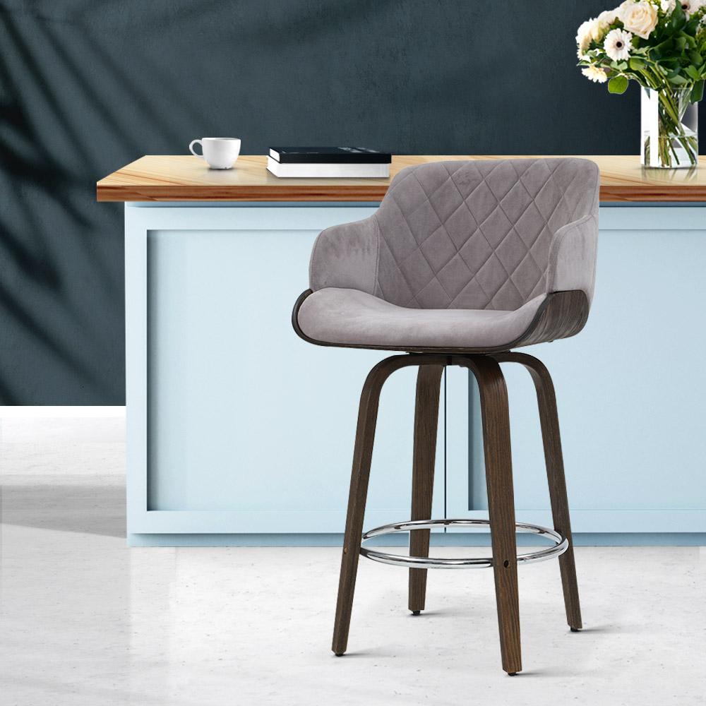 Artiss Velvet Bar Stool in Grey with Wood Frame, featuring a plush velvet seat, contoured backrest, and chrome footrest.