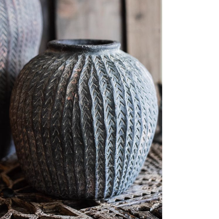 Artisan Handcrafted Antique Vase in gray concrete, showcasing its elegant design and sturdy construction.