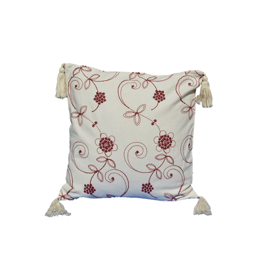 Artisanal hand-embroidered cotton throw pillow featuring intricate designs and mirror appliqué, perfect for home decor.