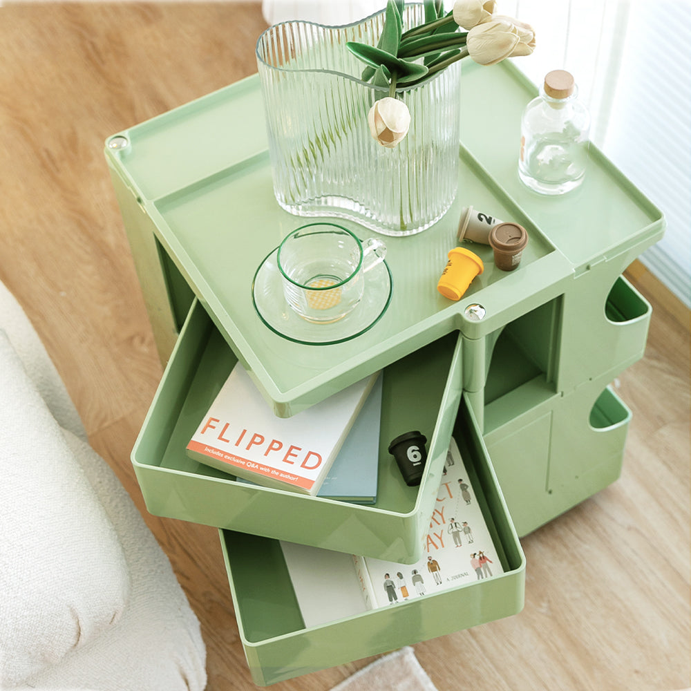 ArtissIn Green 3-Tier Bedside Table Storage Trolley with fold-out shelves and wheels, showcasing its stylish design and practical storage features.