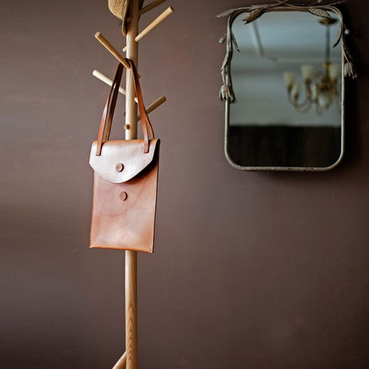 Elegant Ash Wood Coat Rack with multiple hooks, showcasing natural wood grain and finish, perfect for entryway organization.