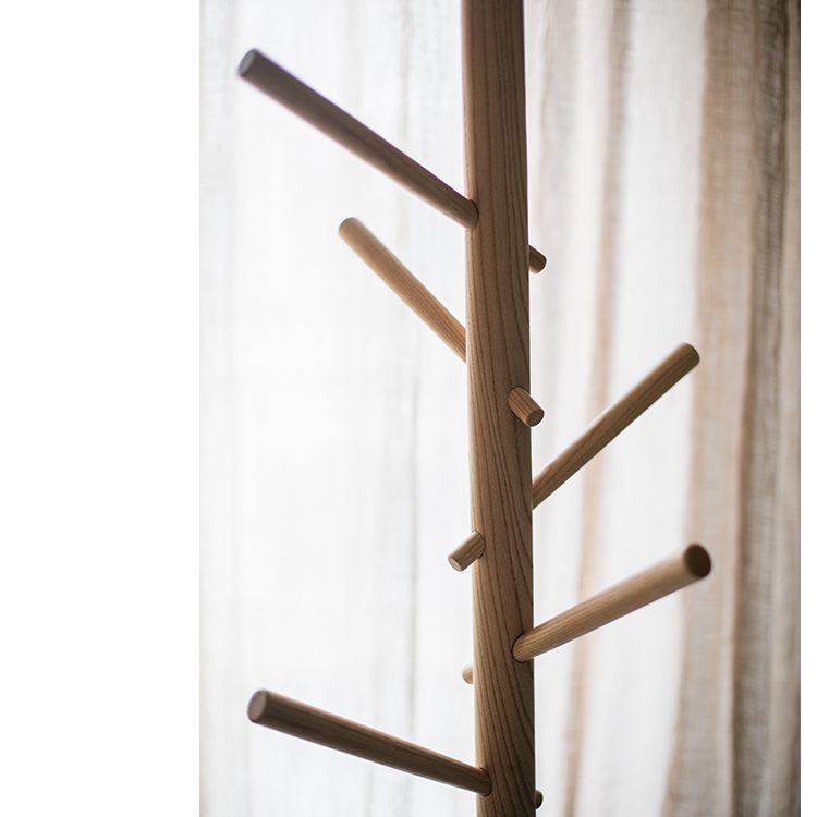 Elegant Ash Wood Coat Rack with multiple hooks, showcasing natural wood grain and finish, perfect for entryway organization.