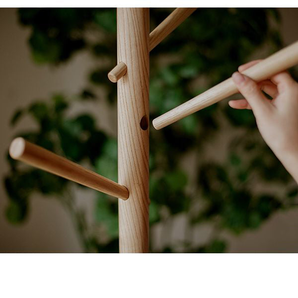 Elegant Ash Wood Coat Rack with multiple hooks, showcasing natural wood grain and finish, perfect for entryway organization.