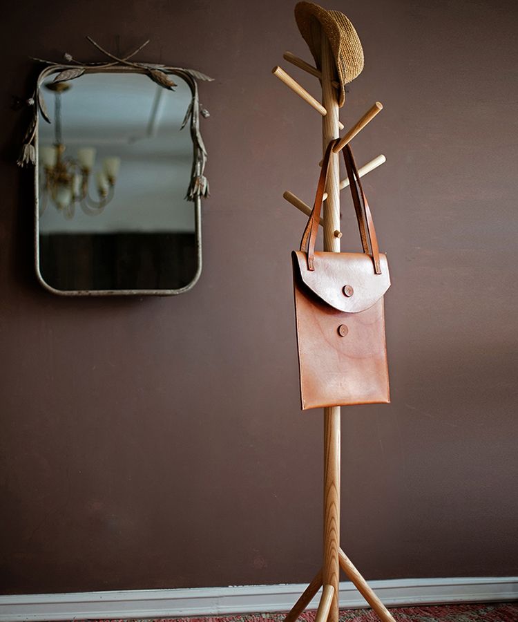 Elegant Ash Wood Coat Rack with multiple hooks, showcasing natural wood grain and finish, perfect for entryway organization.