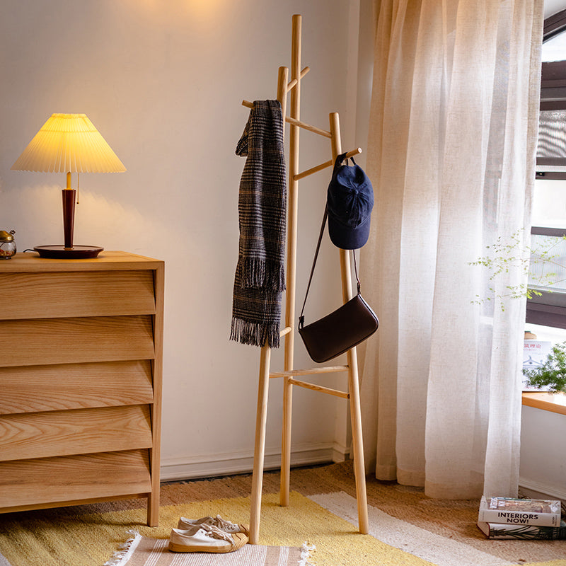 Elegant Ash Wood Coat Rack standing tall, showcasing natural wood grain and design, perfect for entryways.