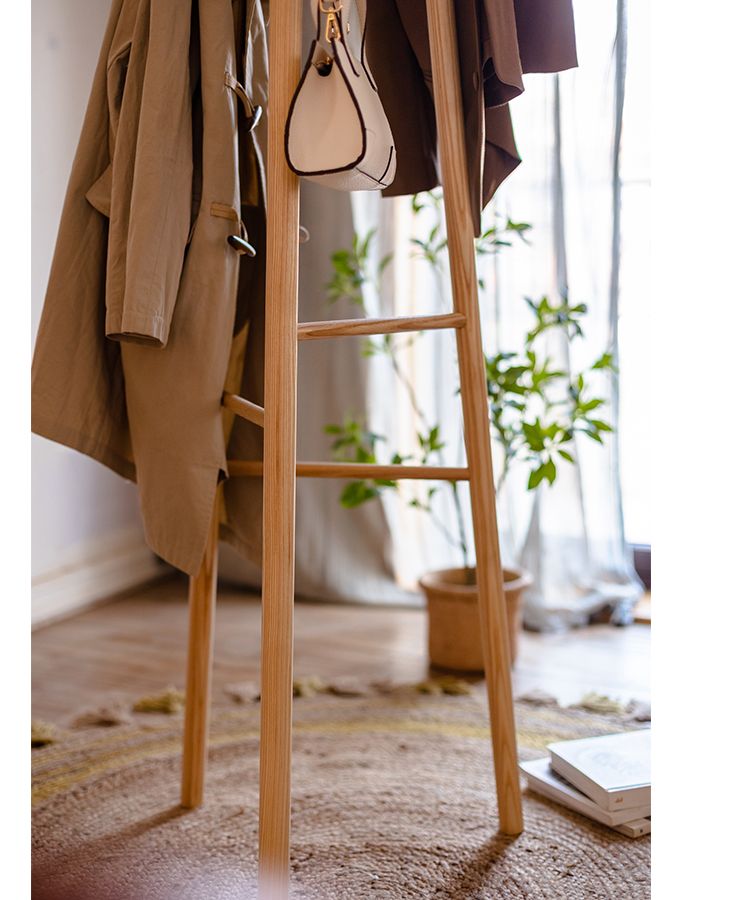 Elegant Ash Wood Coat Rack standing tall, showcasing natural wood grain and design, perfect for entryways.