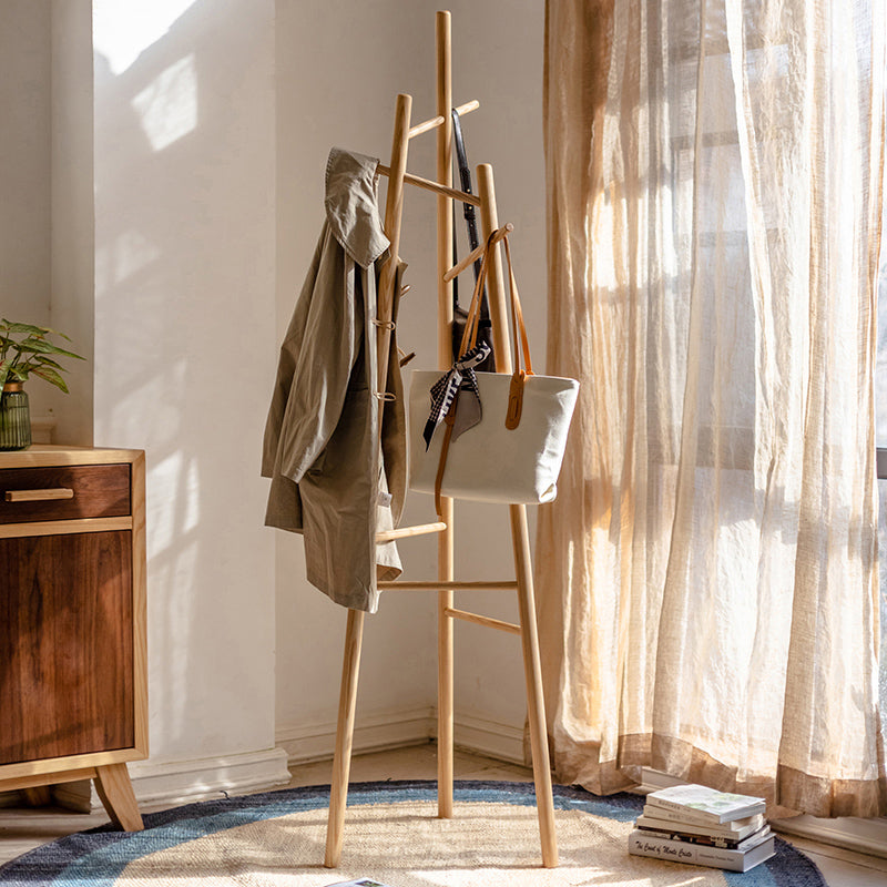 Elegant Ash Wood Coat Rack standing tall, showcasing natural wood grain and design, perfect for entryways.