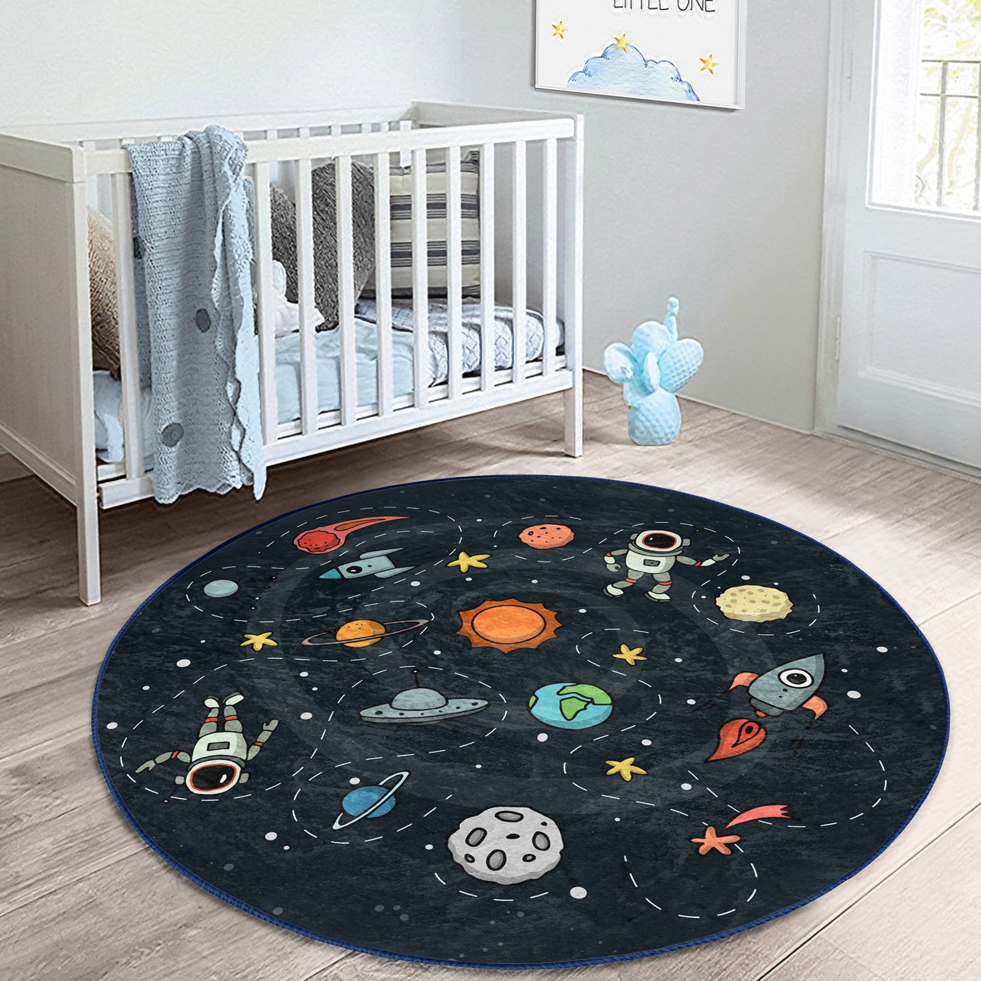 A colorful round rug featuring playful astronauts and space rockets, designed for kids' rooms, showcasing a soft velvet texture.