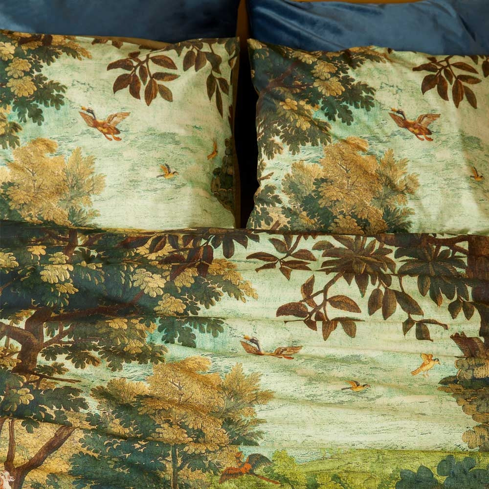 Idyllic Green Quilt Cover Set featuring botanical landscape print with animals, made from soft 100% cotton sateen fabric.