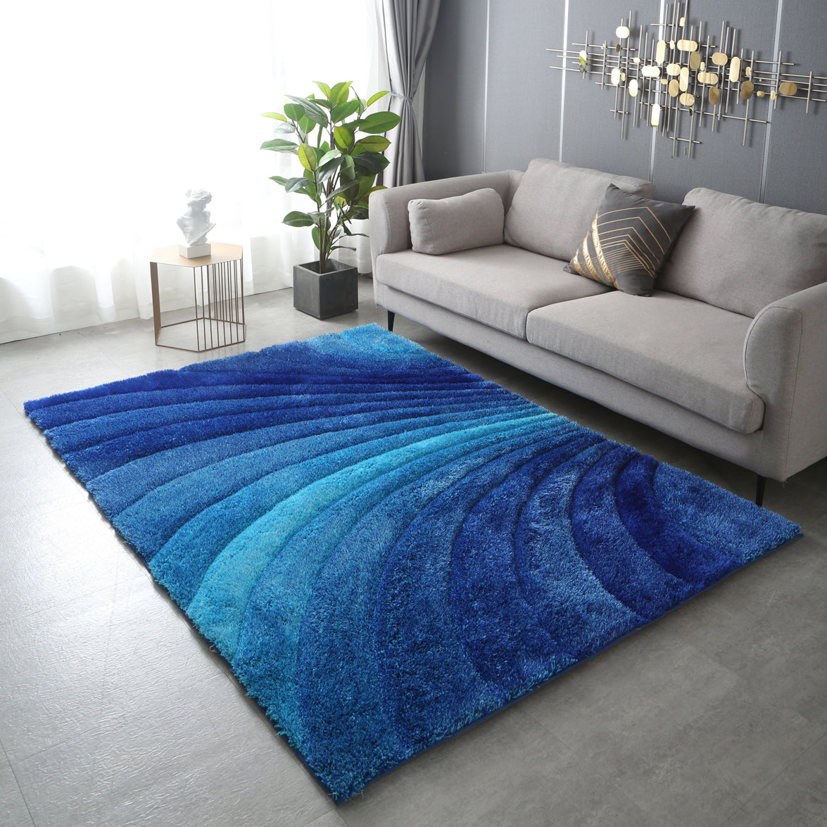 Aurora 3D Blue Shag Rug with modern wave design, showcasing vibrant blue colors and plush texture, perfect for any room.