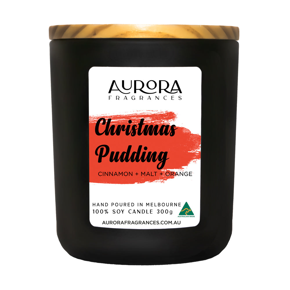 Aurora Christmas Pudding Scented Soy Candle in a matte black jar, showcasing its elegant design and festive appeal.