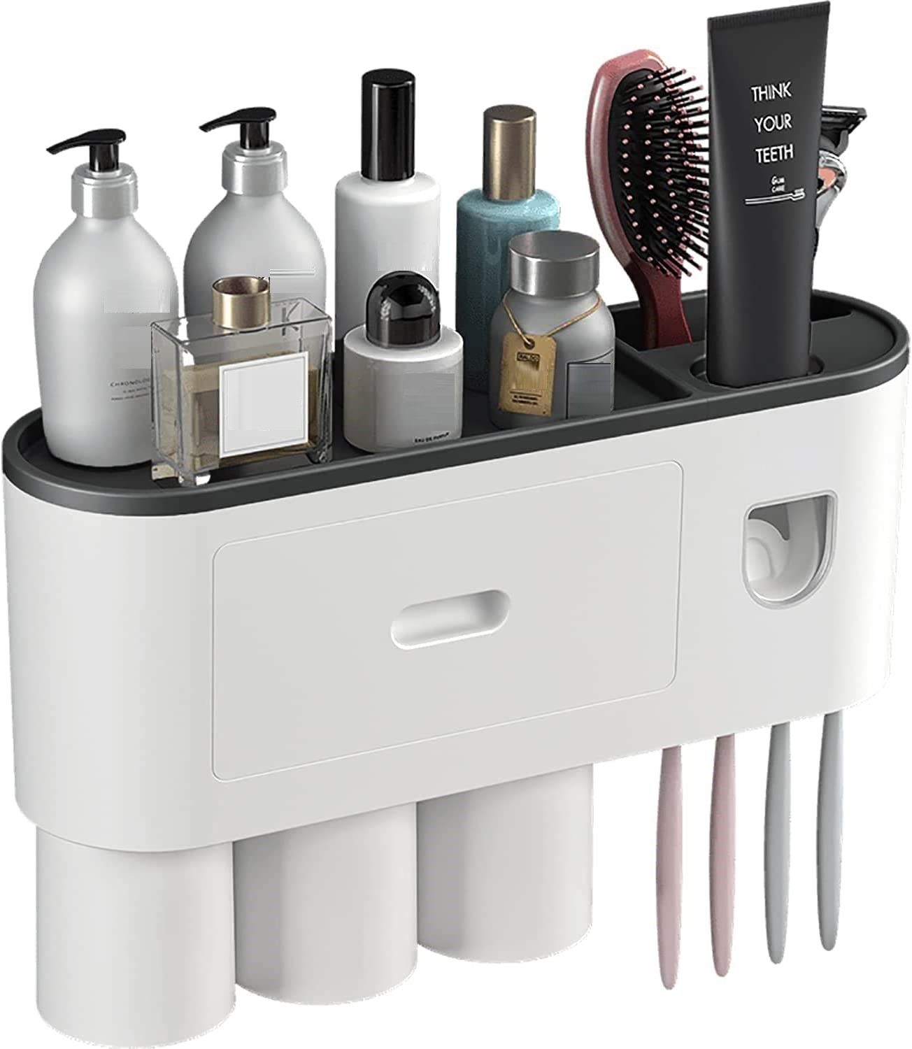 Automatic wall mounted toothbrush holder with magnetic cups in white and black, designed for kids and families, featuring a toothpaste dispenser and storage tray.