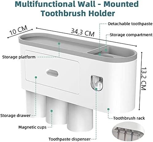 Automatic wall mounted toothbrush holder with magnetic cups in white and gray, designed for kids and families, featuring a toothpaste dispenser and storage tray.