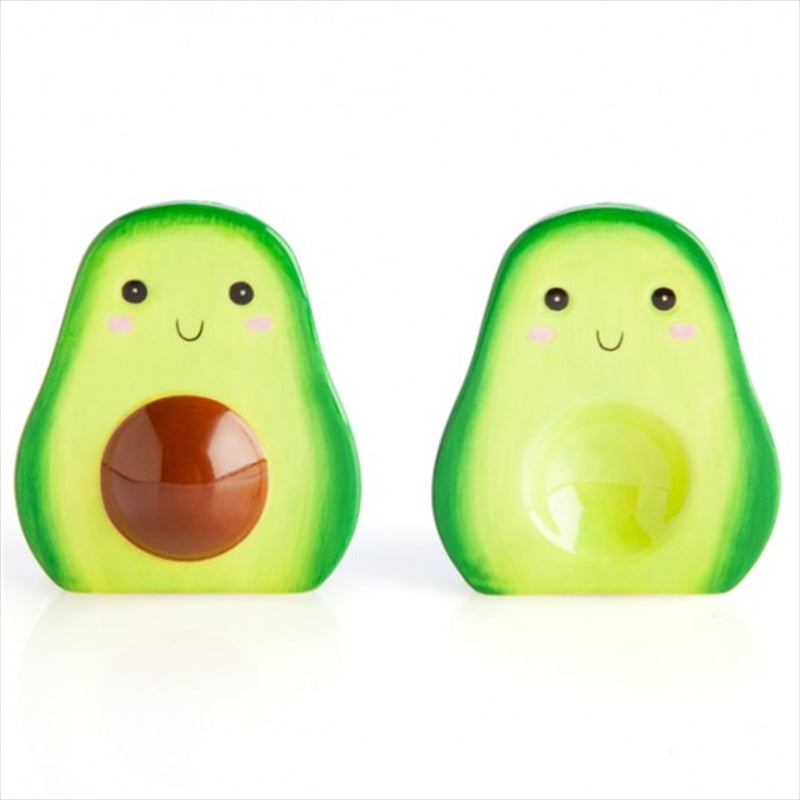 Ceramic salt and pepper shakers shaped like avocado halves, featuring a 3D stone on one half.