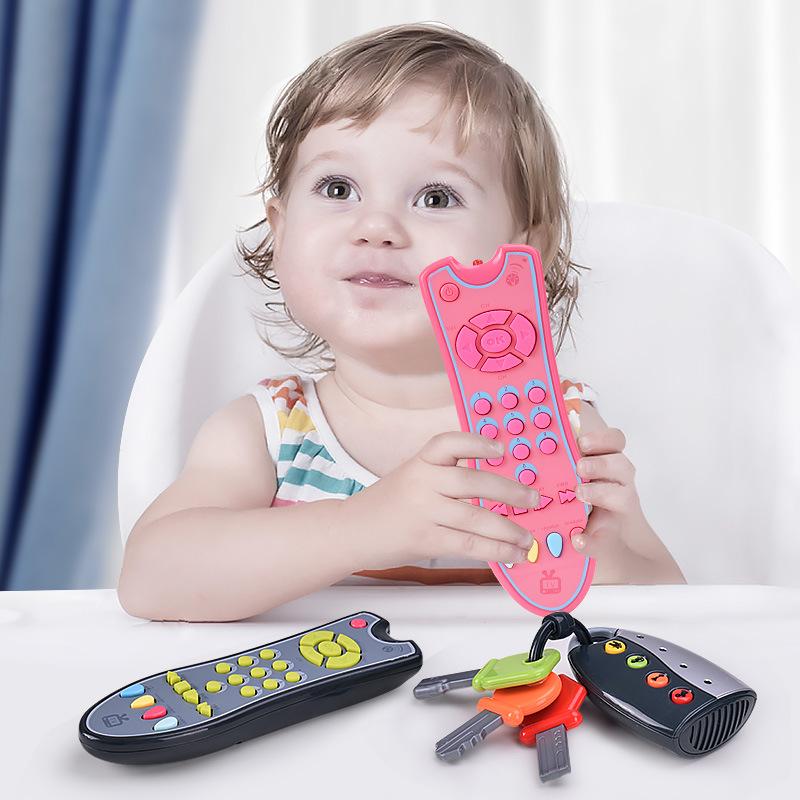 Baby TV simulation remote control in pink and grey, designed for infants with music and English learning features.