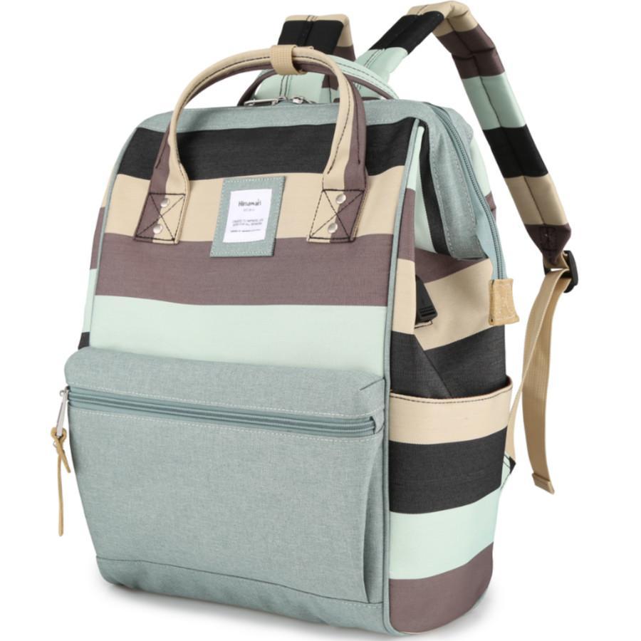 Stylish backpack with large capacity, featuring a stripe design, waterproof polyester fabric, and a computer pocket, ideal for school and travel.