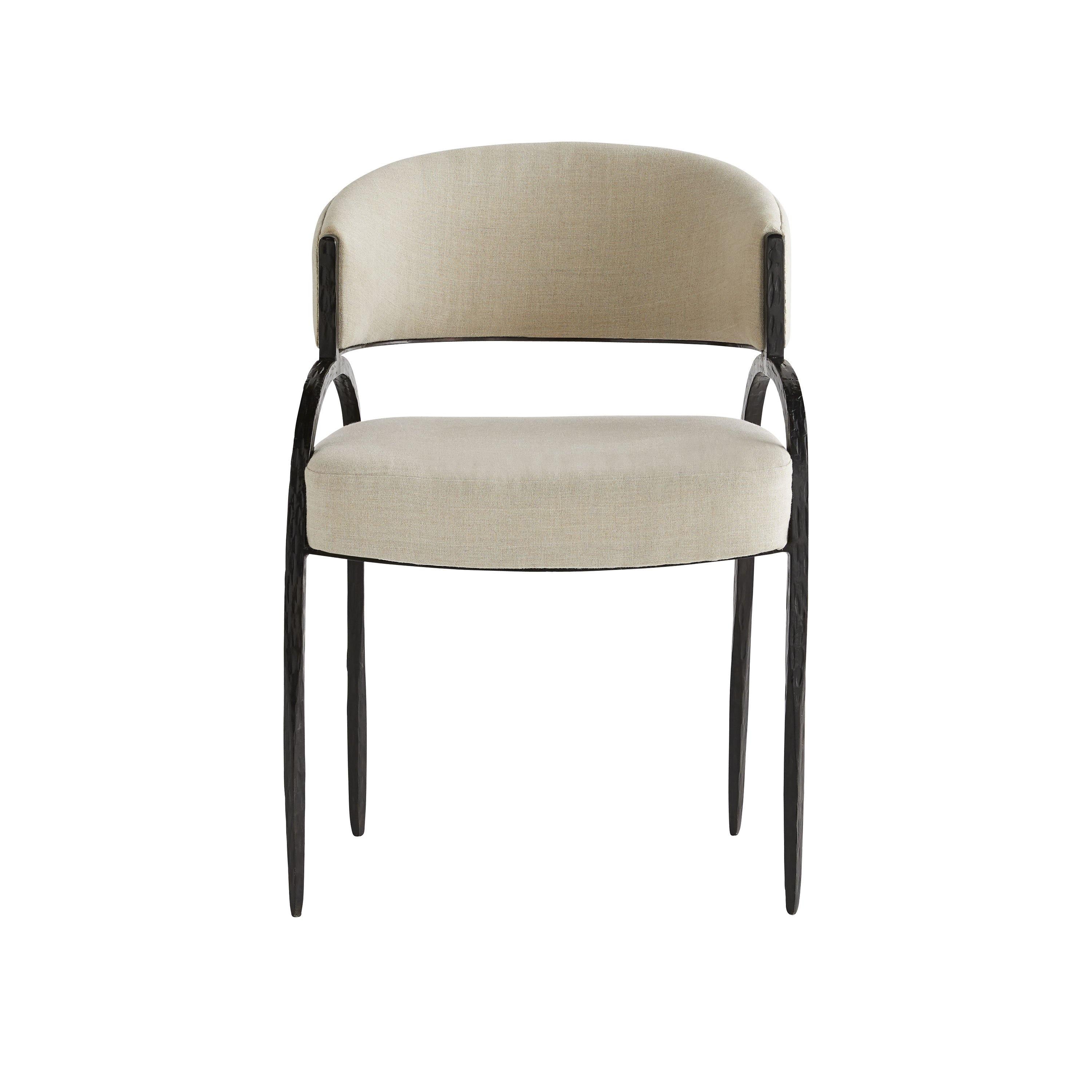 Bahati Chair featuring a curved back, large seat, and hand-forged iron frame with natural linen upholstery in gray color.