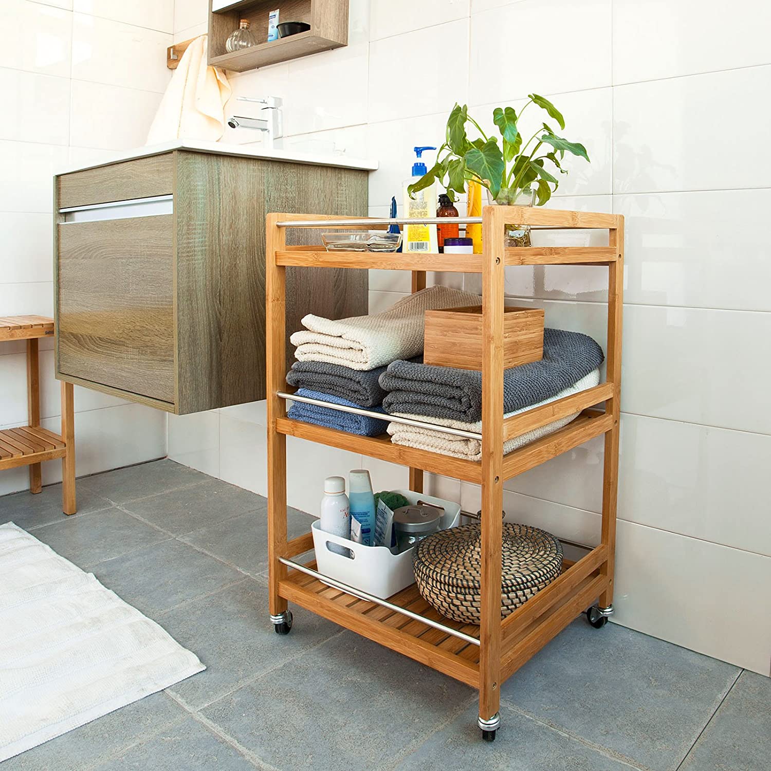 Bamboo Kitchen Trolley 3 Tier Storage Cart with metal castors, showcasing its elegant design and practical storage space.