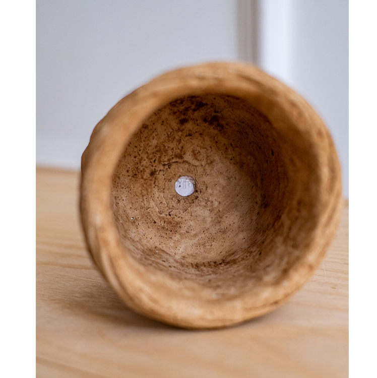 Bamboo Looking Cement Planter in khaki color, showcasing its unique bamboo-like design and drainage hole.