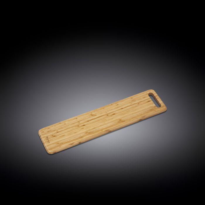 A long rectangular bamboo serving board with a cut-out handle, showcasing its natural texture and elegant design.