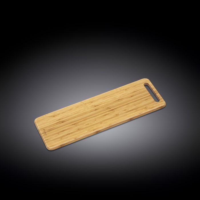 WILMAX Bamboo Long Serving Board, 23.6 inches by 7.9 inches, showcasing its natural texture and cut-out handle.