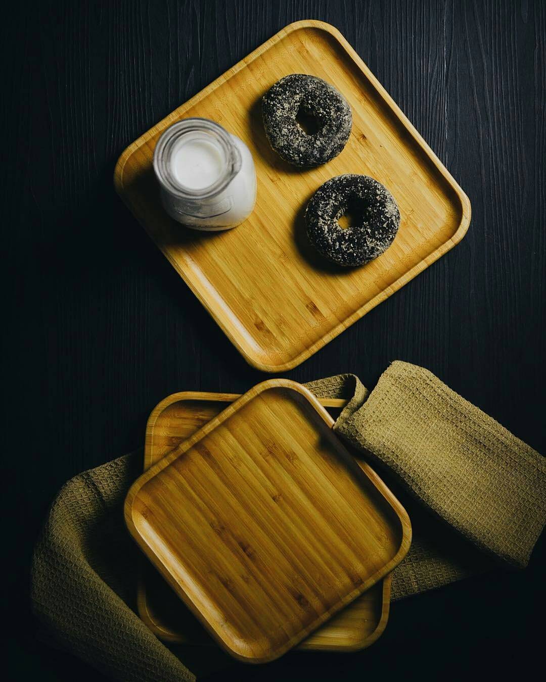 A stylish 13-inch square bamboo platter, perfect for serving appetizers and barbecues, showcasing its natural texture and eco-friendly design.