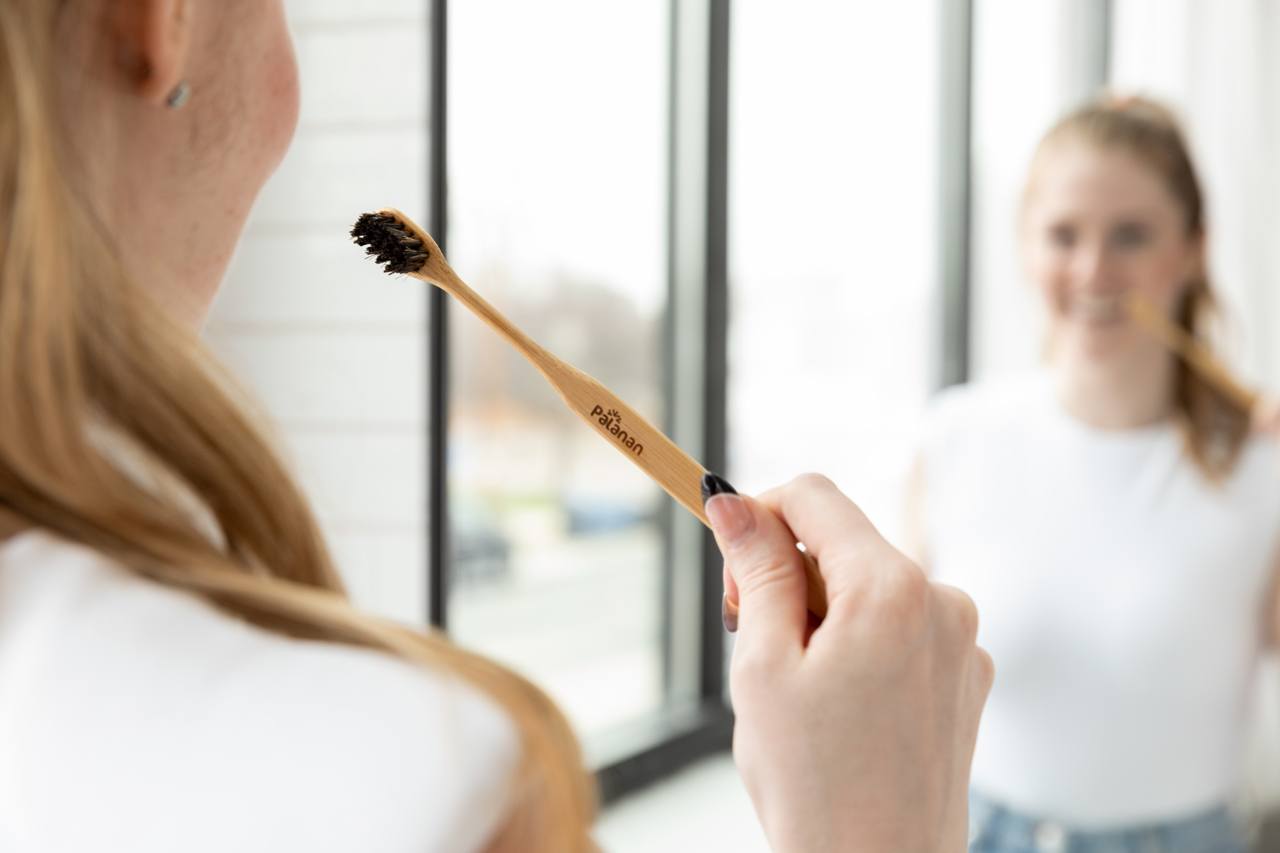 Bamboo Toothbrush Bundle - Mix featuring 2 white and 2 dark bamboo toothbrushes, eco-friendly and sustainable oral care solution.