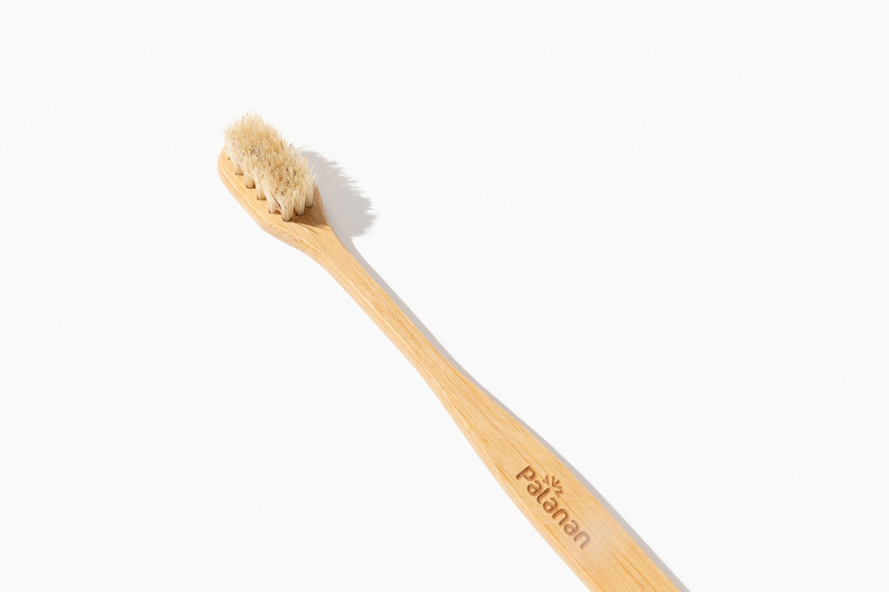 Bamboo Toothbrush Bundle - Mix featuring 2 white and 2 dark bamboo toothbrushes, eco-friendly and sustainable oral care solution.