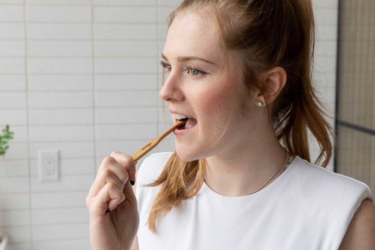 Bamboo Toothbrush Bundle - Mix featuring 2 white and 2 dark bamboo toothbrushes, eco-friendly and sustainable oral care solution.