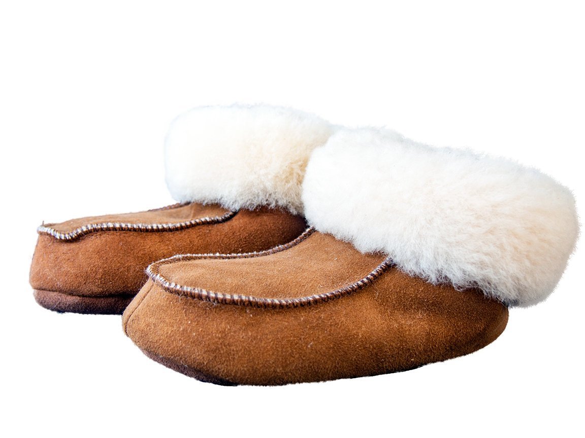 Bambosze Sheepskin Slippers made from natural sheepskin and leather, showcasing their elegant design and plush texture.