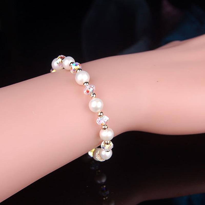 Elegant 8mm imitation pearl bracelet with toggle clasp, showcasing a simple and stylish design suitable for women.