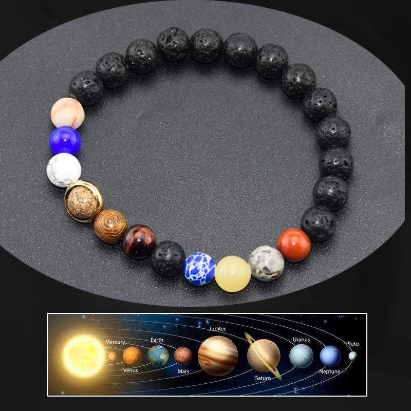 Beaded bracelet featuring volcanic stone and moonstone, designed with a galaxy solar system theme for men and women.