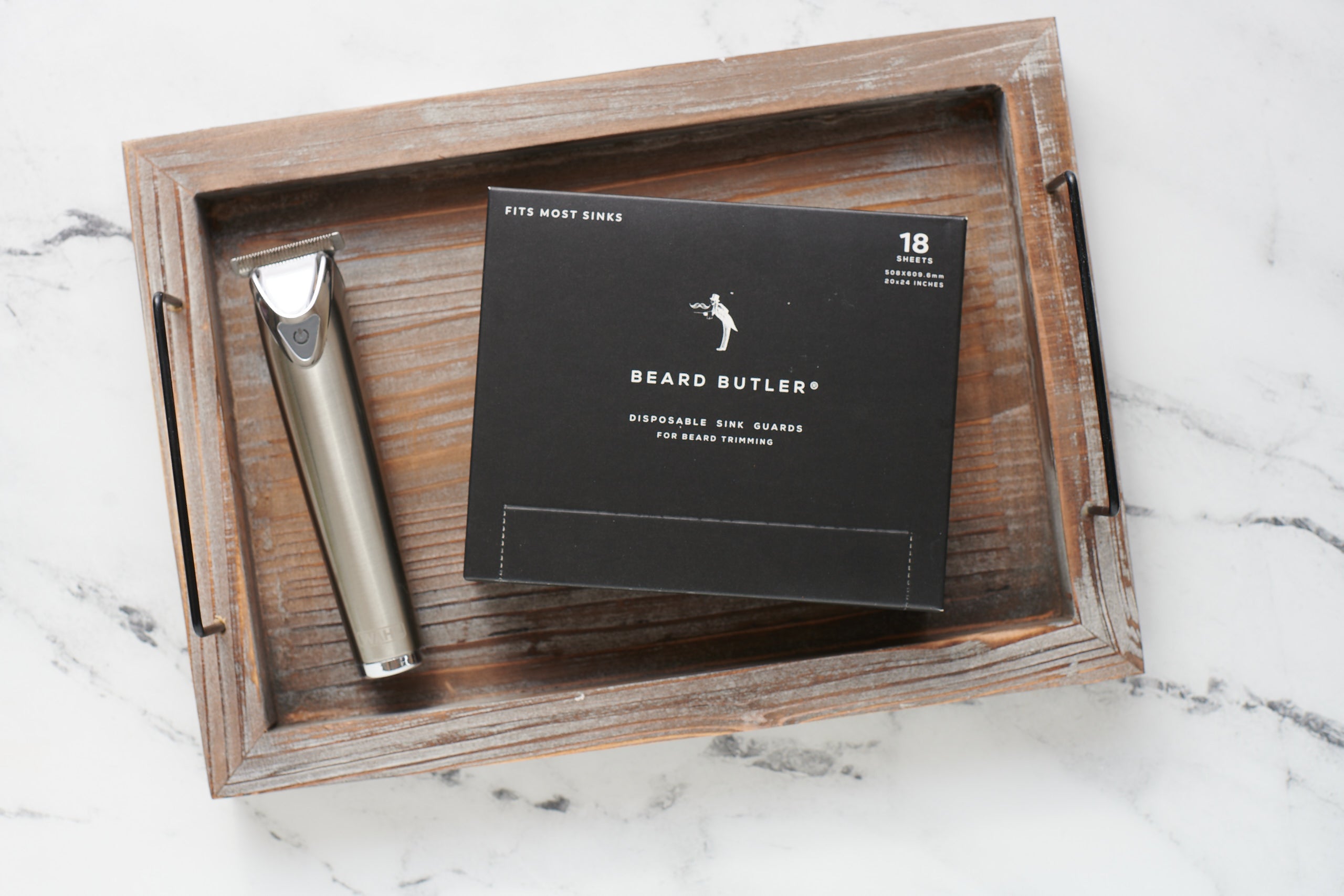 Beard Butler® Disposable Sink Guards package featuring biodegradable tissues for catching beard hair during grooming.