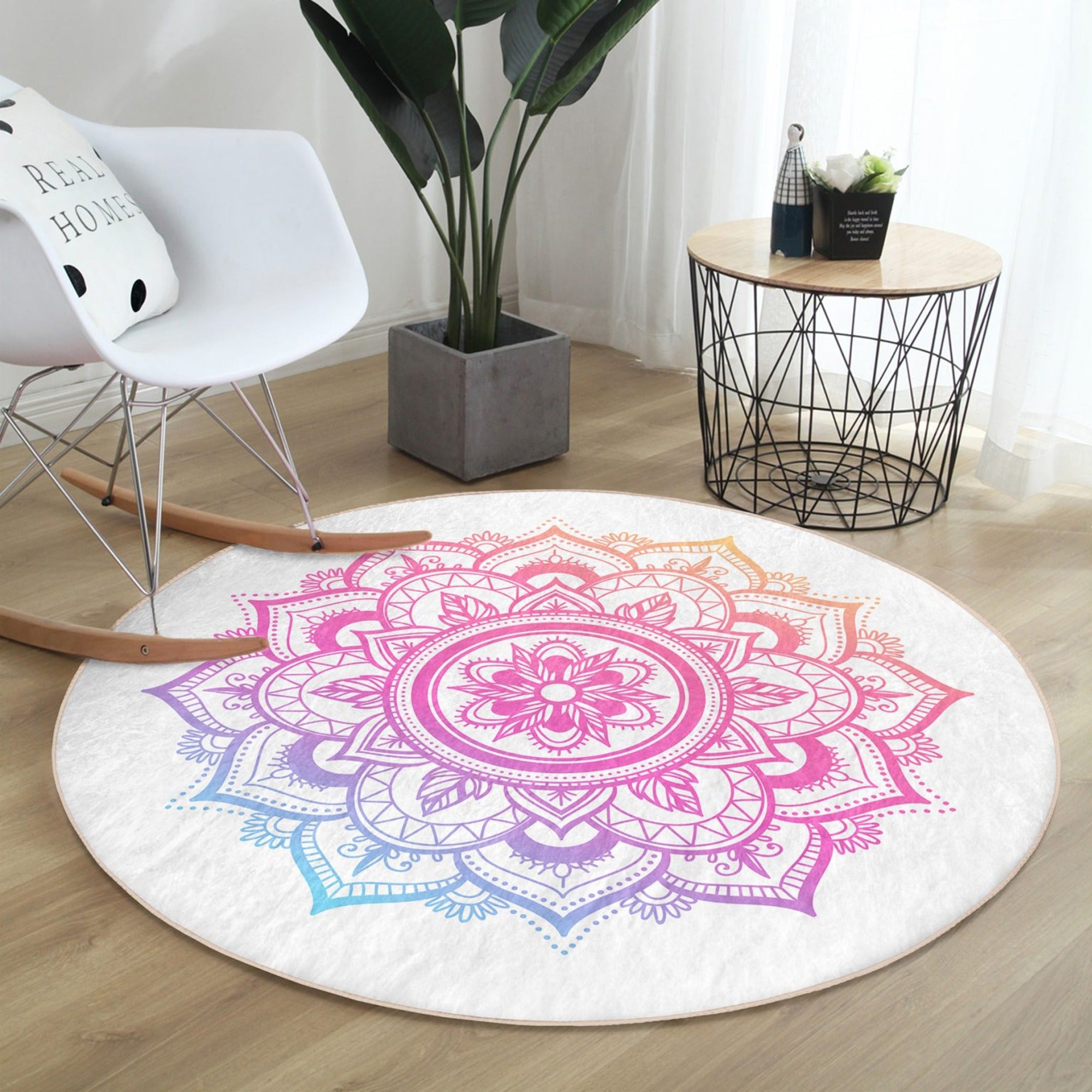 A beautifully designed round rug featuring a vibrant mandala pattern, perfect for cozy home decor and meditation spaces.