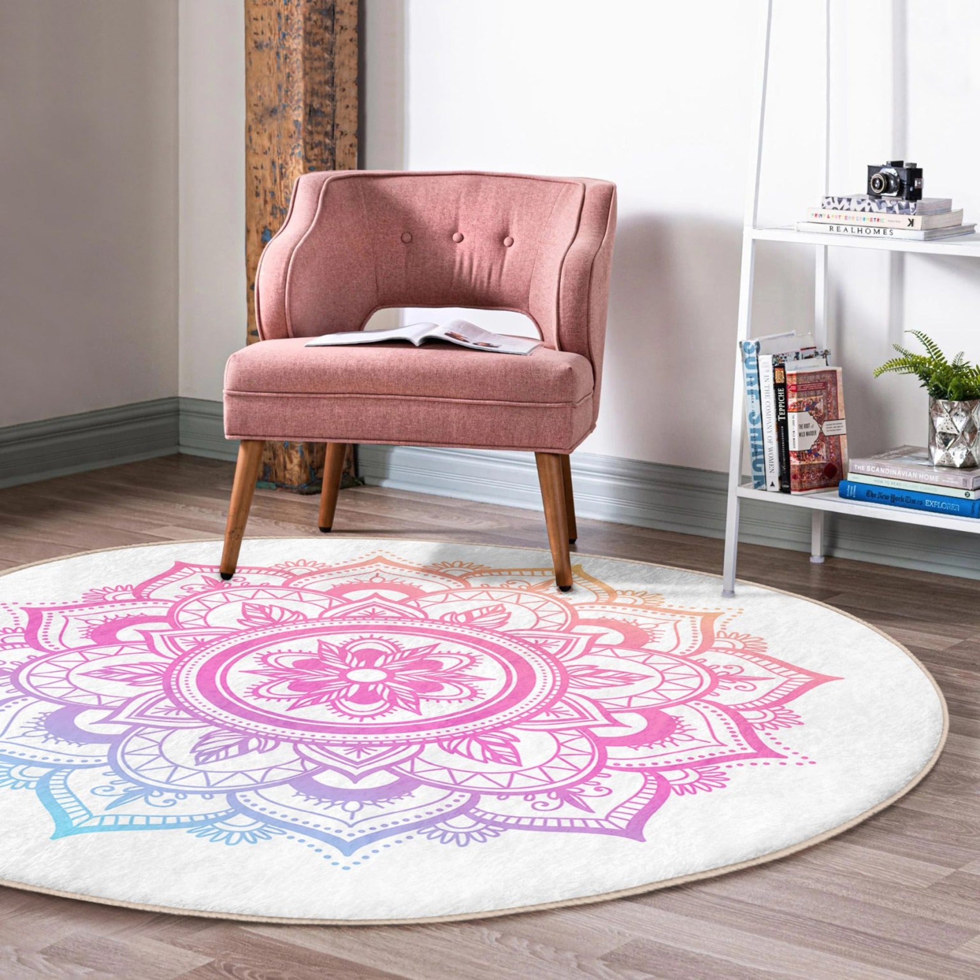 A beautifully designed round rug featuring a vibrant mandala pattern, perfect for cozy home decor and meditation spaces.