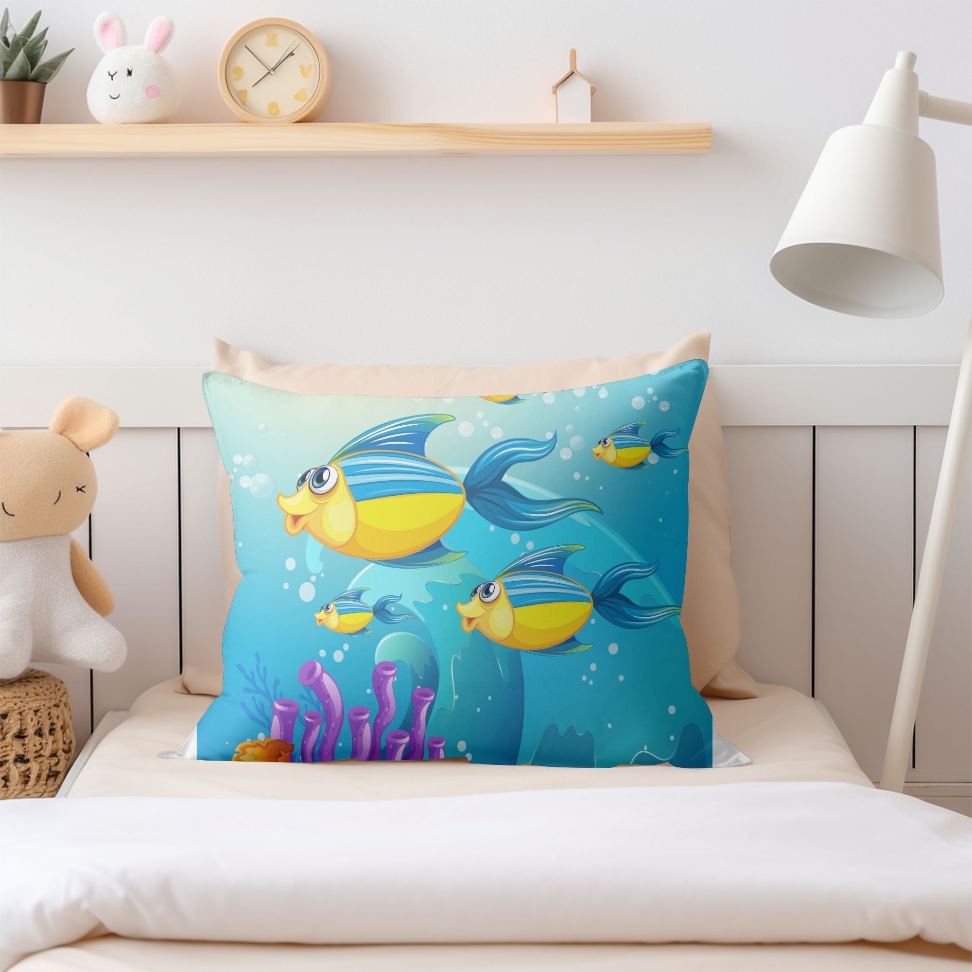 Beautiful Ocean Fishes Kids Pillow featuring vibrant fish designs on one side and a light cream back, perfect for children's rooms and outdoor use.