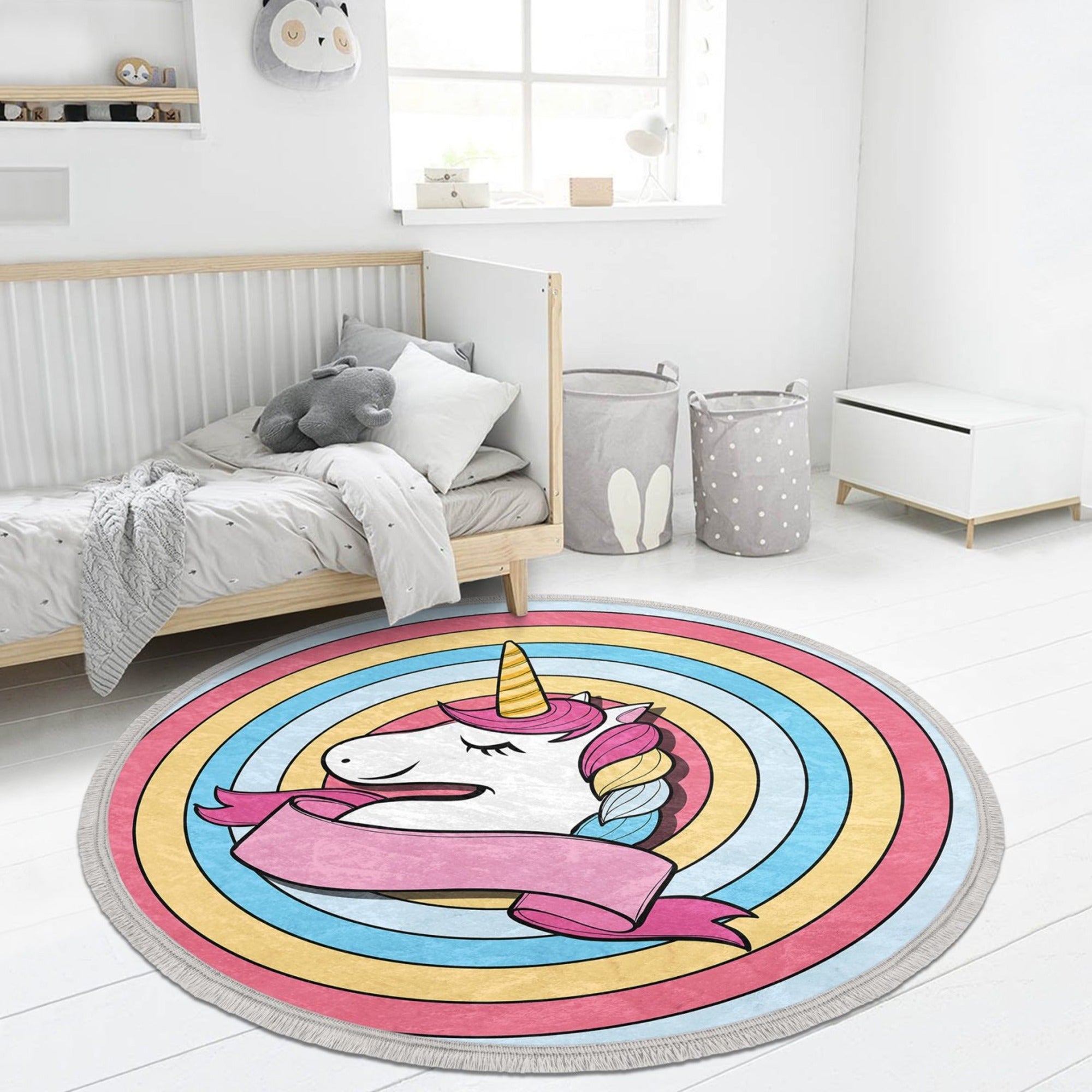 Beautiful round rug featuring a vibrant unicorn design, perfect for kids' rooms and nurseries, made from soft velvet fabric.