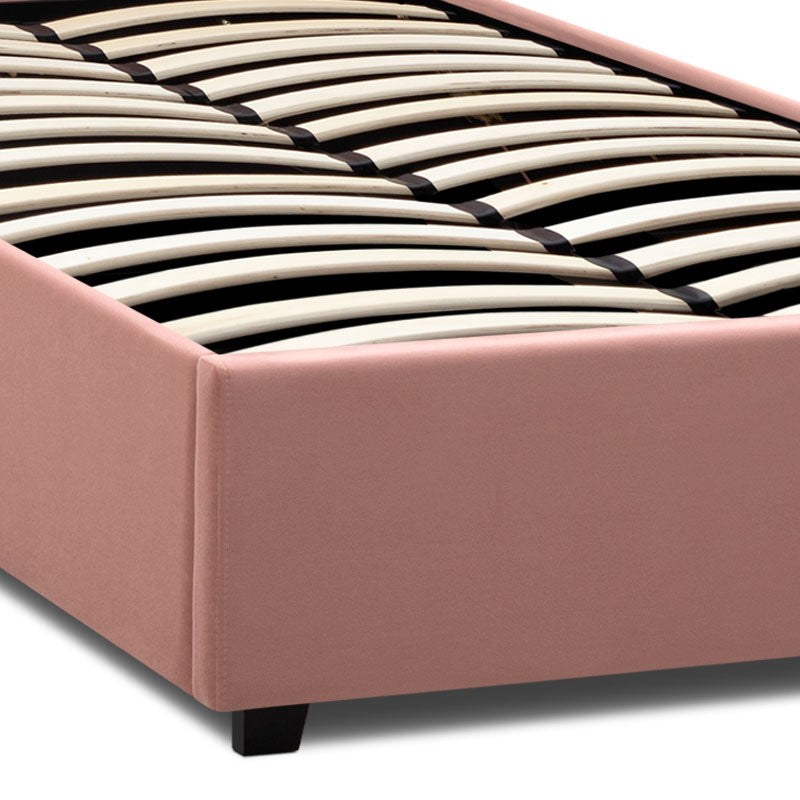 CELLO Pink Bed with plush velvet upholstery and under-bed storage, featuring anatomical slats and black wooden legs.