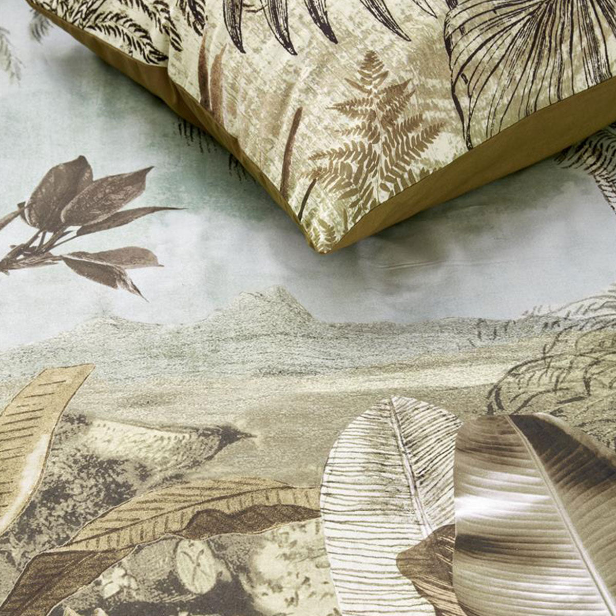 Banda Green Cotton Quilt Cover Set featuring banana leaves and palm trees design in natural tones on a calming background.