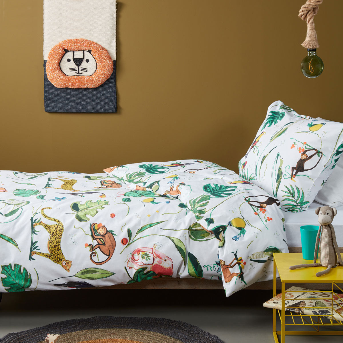 Crazy Jungle Multi Cotton Quilt Cover Set featuring vibrant jungle animals and colorful floral designs on soft cotton fabric.