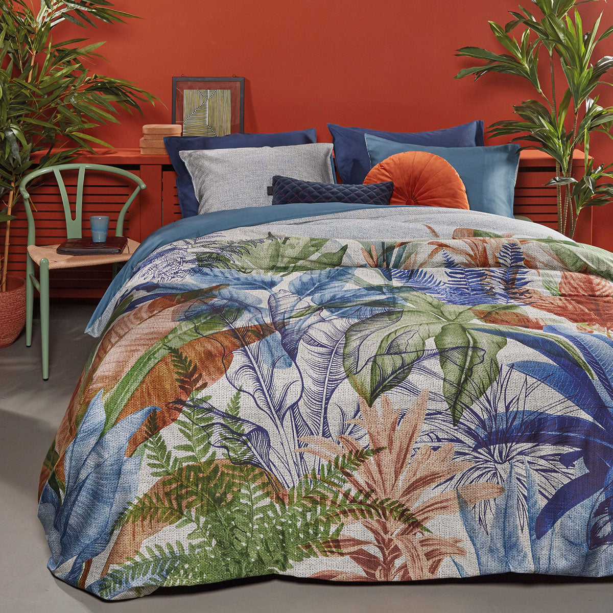 Isla Blue Cotton Sateen Quilt Cover Set featuring tropical foliage design in vibrant colors.