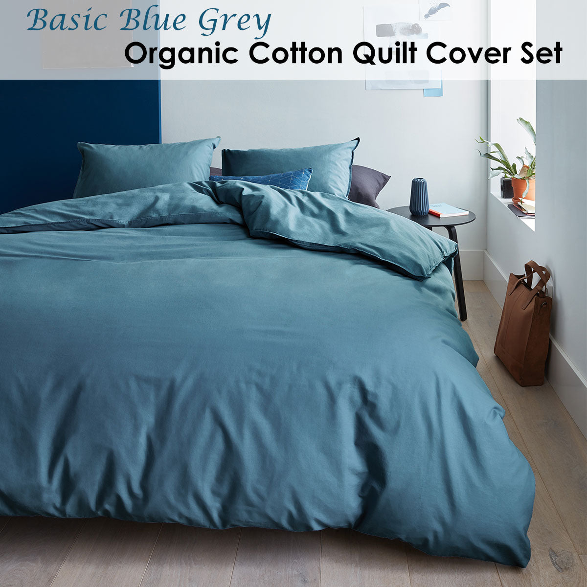 Bedding House Organic Cotton Basic Blue Grey Quilt Cover Set King displayed on a bed, showcasing its soft texture and elegant color.