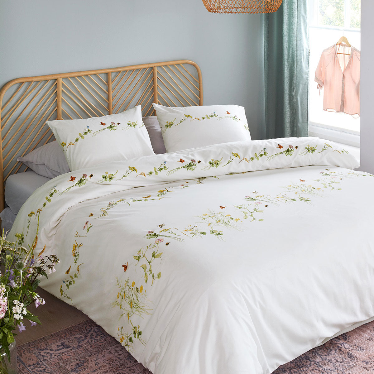 Bedding House Pasture Multi Cotton Quilt Cover Set King featuring vibrant floral designs and butterflies on a white background.