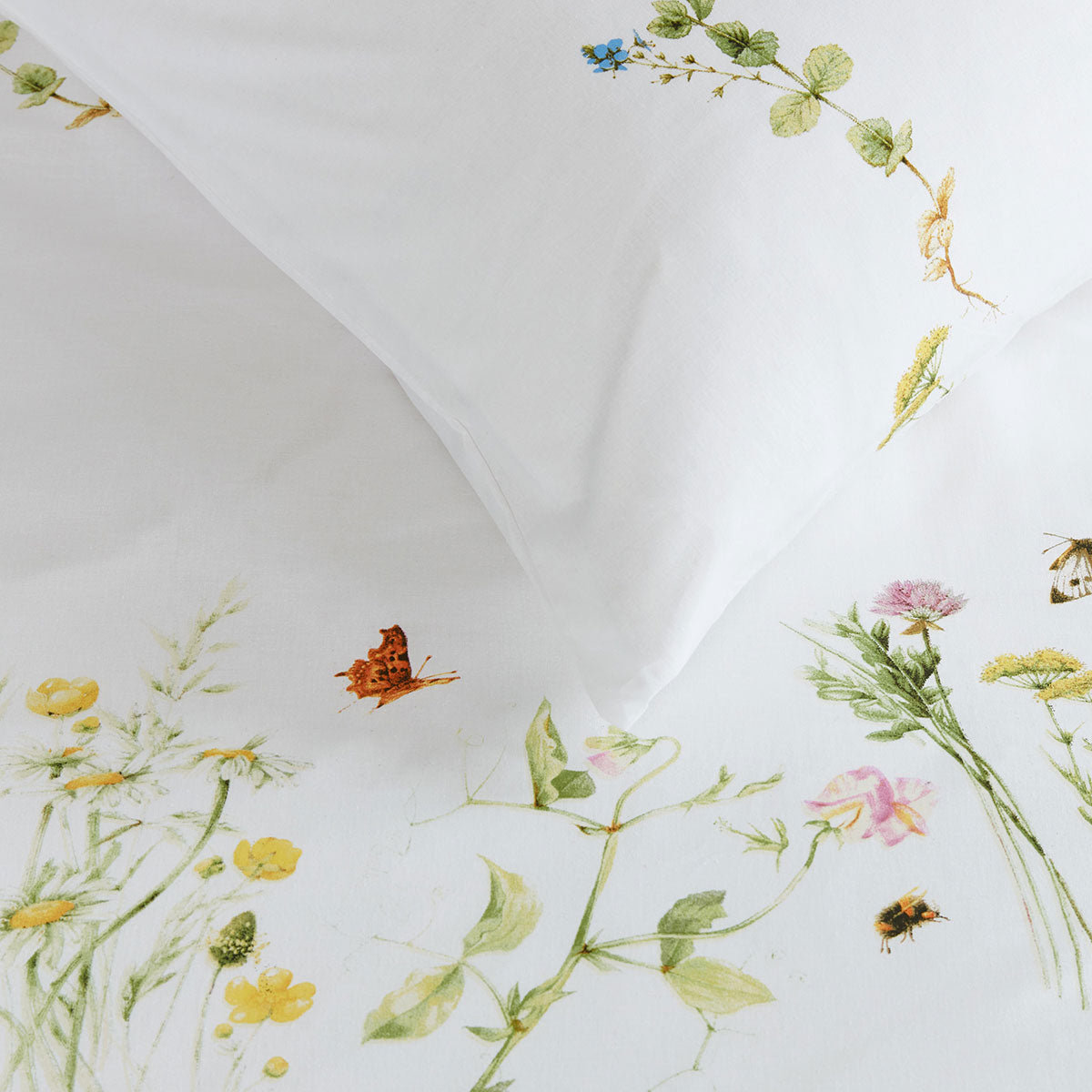 Bedding House Pasture Multi Cotton Quilt Cover Set King featuring vibrant floral designs and butterflies on a white background.