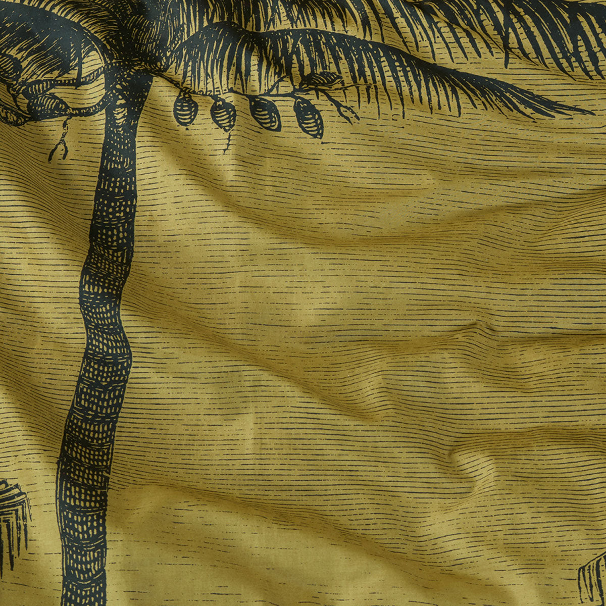 Tour du Monde Ochre Cotton Quilt Cover Set featuring a botanical landscape design with palms on a gold background.