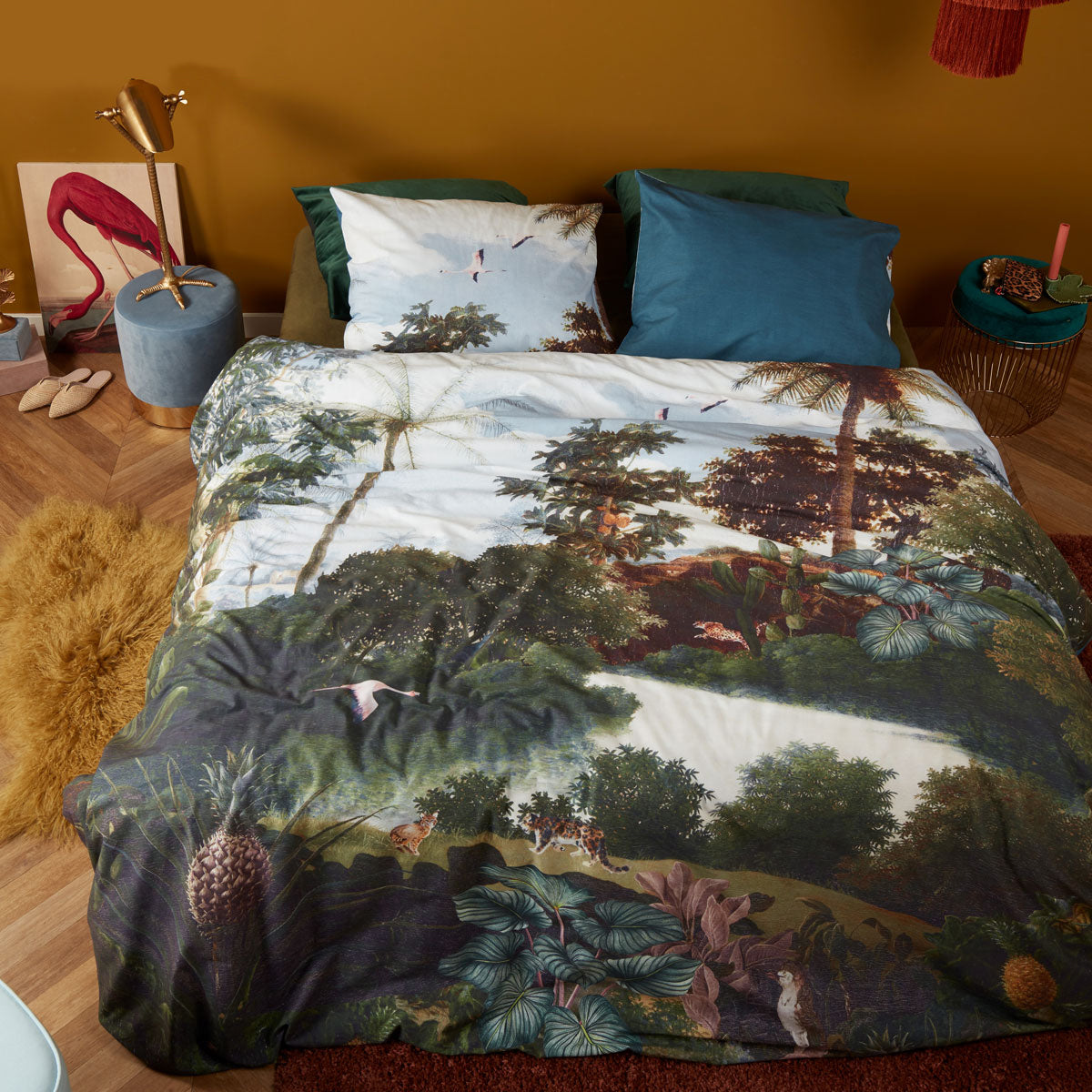 Bedding House Voyage Green Cotton Quilt Cover Set featuring a vibrant botanical landscape with animals and a serene river.