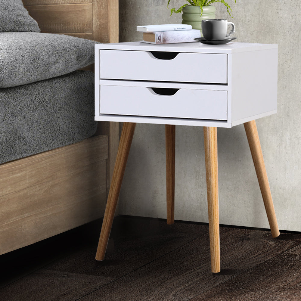 Bodie Bedside Table featuring Scandinavian design with two drawers and splayed legs, finished in white particle board.