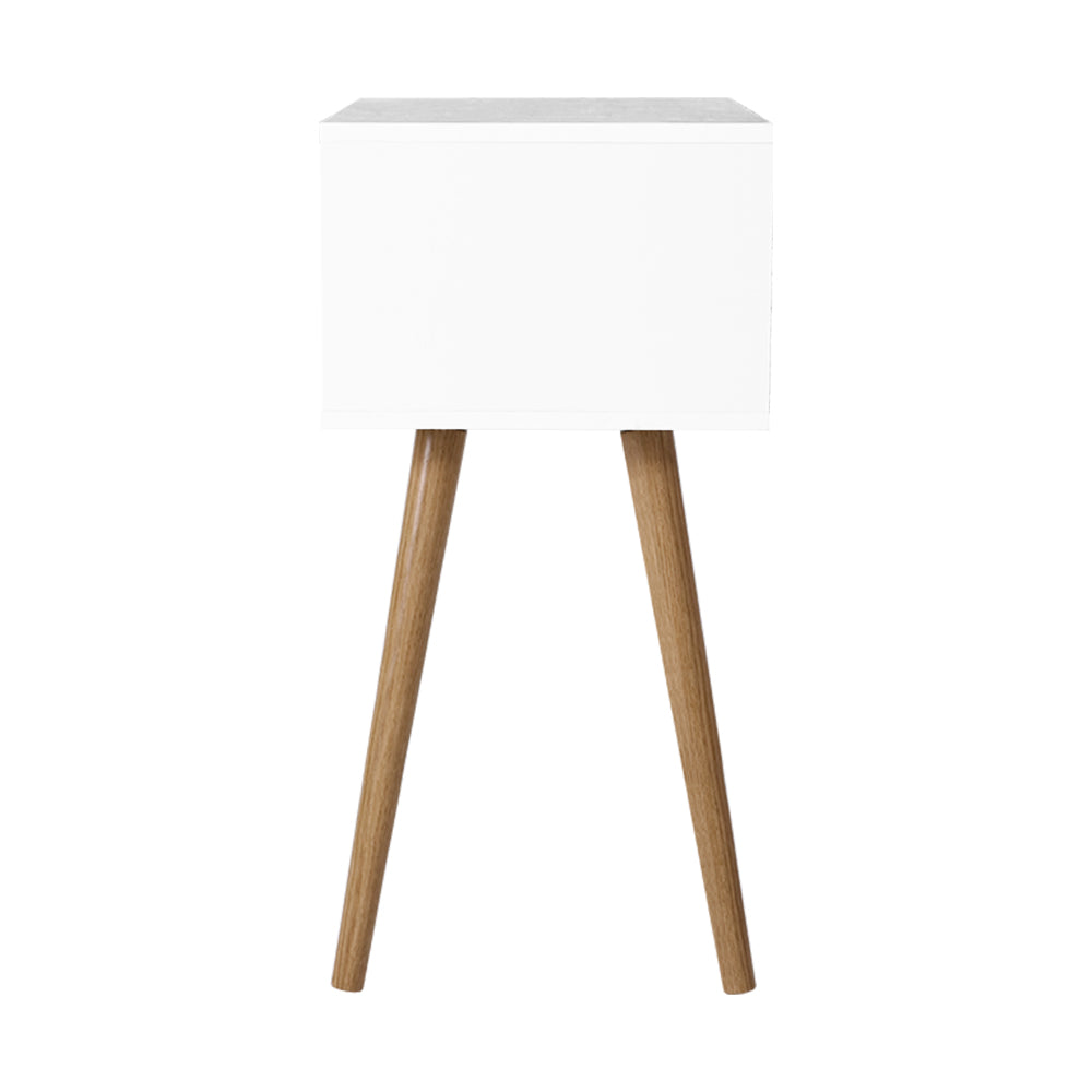 Bodie Bedside Table featuring Scandinavian design with two drawers and splayed legs, finished in white particle board.